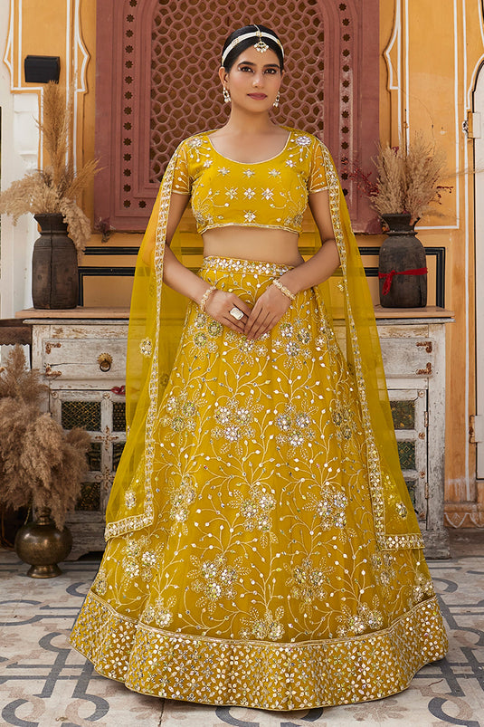 Mustard Color Alluring Sequins Work Lehenga Choli In Net Fabric