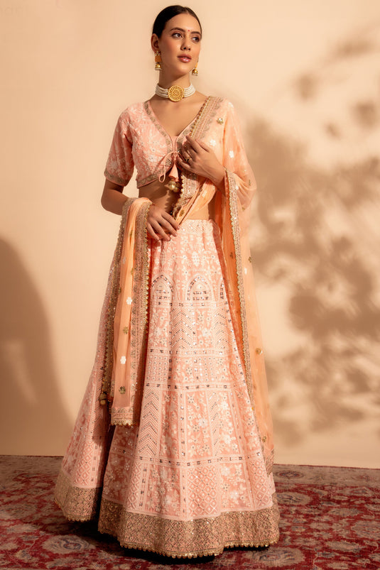 Excellent Georgette Fabric Peach Color Lehenga With Sequins Work