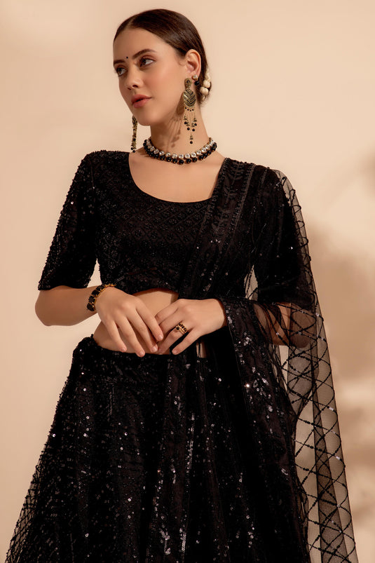Tempting Net Fabric Black Color Lehenga With Sequins Work
