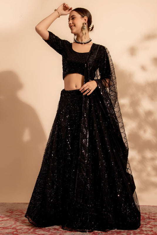 Tempting Net Fabric Black Color Lehenga With Sequins Work