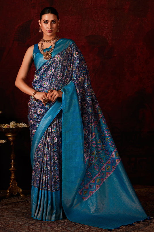 Soothing Patola Style Printed Silk Saree In Navy Blue Color