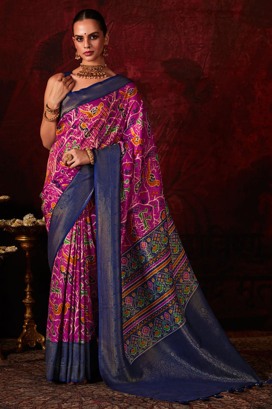Delicate Rani Color Patola Style Printed Silk Saree