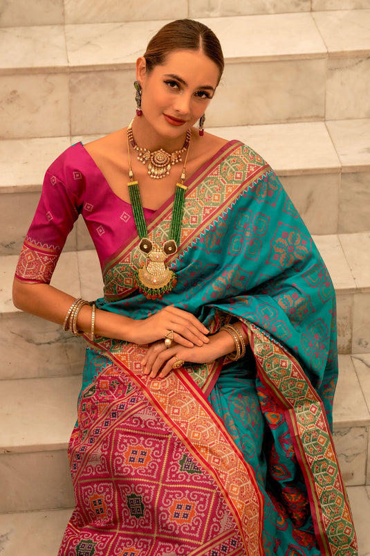 Weaving Work Soothing Banarsi Silk Patola Saree In Cyan Color
