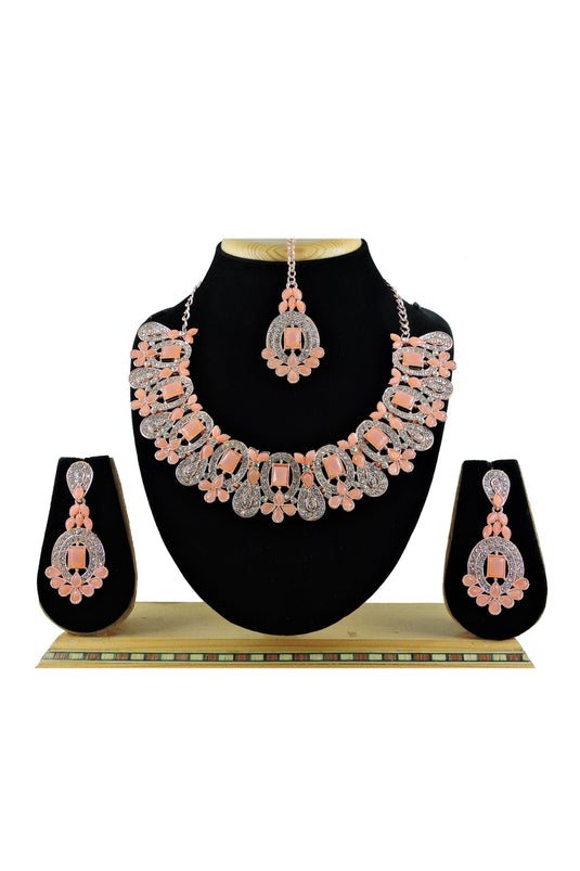 Peach Color Alloy Material Stunning Necklace With Earrings And Mang Tikka