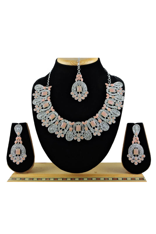 Engaging Peach Color Alloy Material Necklace With Earrings And Mang Tikka