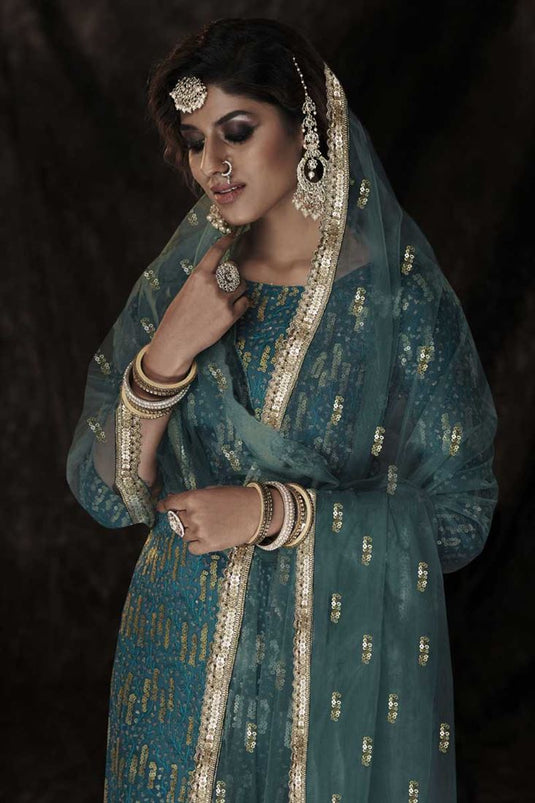 Exclusive Teal Color Net Fabric Function Wear Special Sharara Suit With Sequins Work