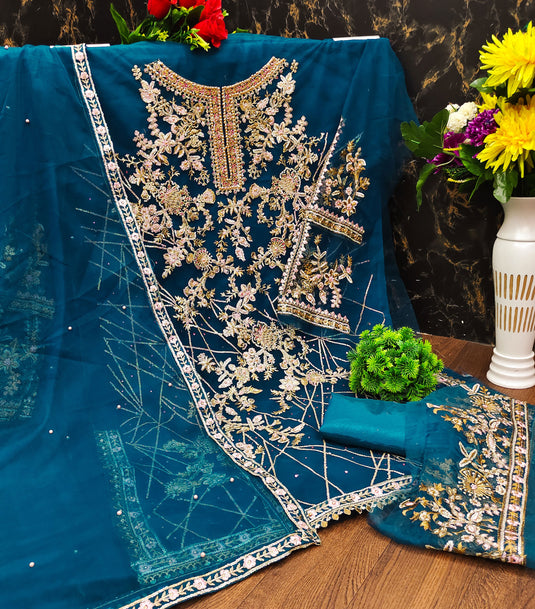 Teal Color Party Wear Net Fabric Incredible Pakistani Replica Suit