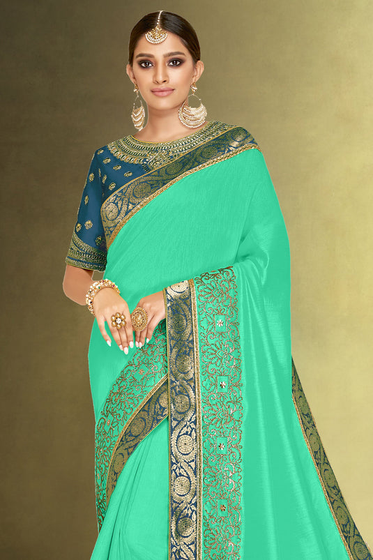 Radiant Function Wear Sea Green Color Satin Silk Fabric Saree