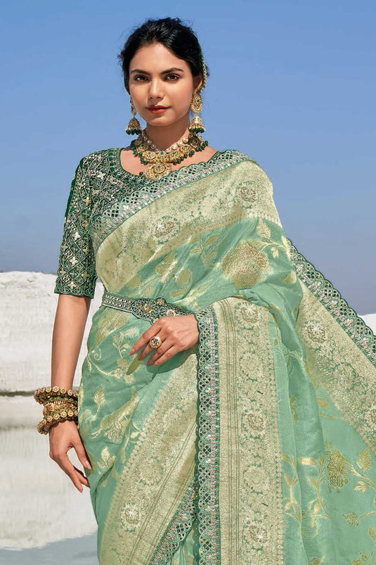 Soothing Sea Green Color Silk Fabric Wedding Wear Saree