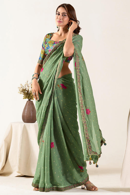 Sea Green Color Fantastic Georgette Fabric Saree With Border Work