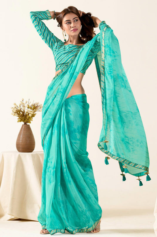 Border Work On Cyan Color Aristocratic Georgette Fabric Saree