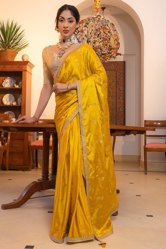 Soothing Embroidered Work On Yellow Color Silk Fabric Saree