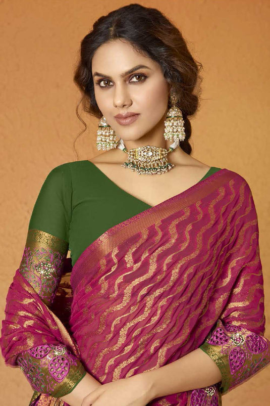 Alluring Rani Color Embroidered Georgette Saree