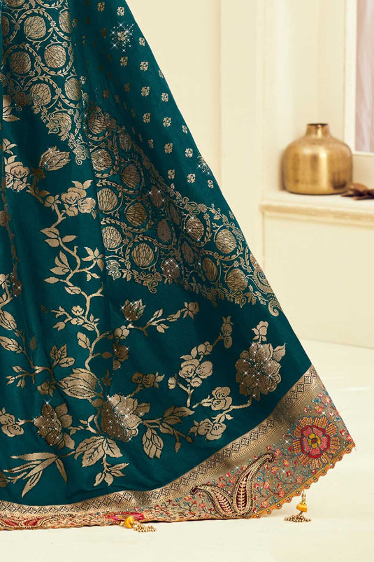 Attractive Weaving Designs Silk Saree In Teal Color