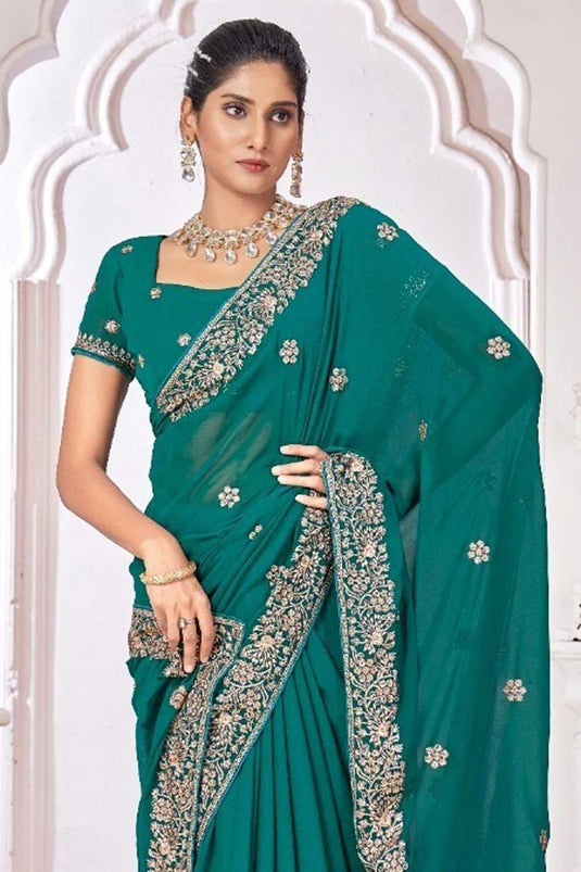 Imposing Georgette Border Work Saree In Sea Green Color