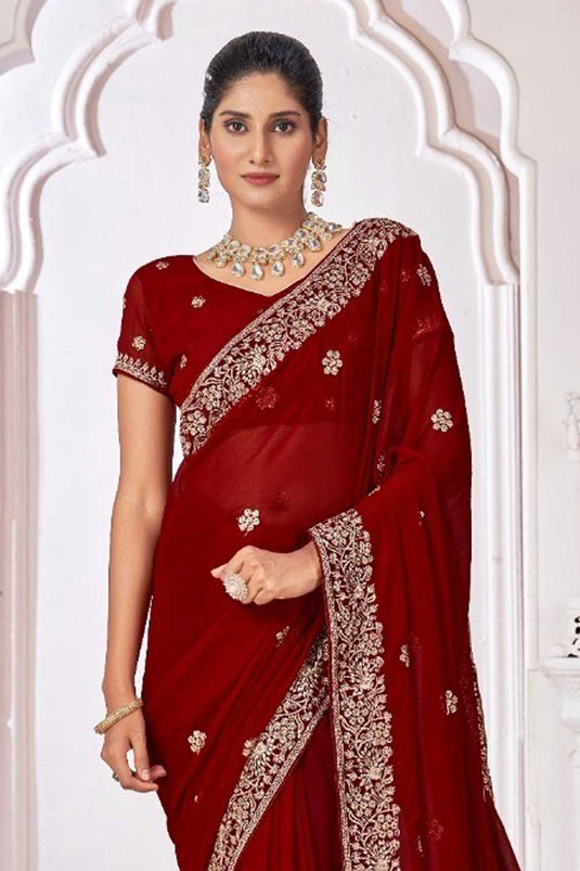 Soothing Georgette Border Work Saree In Maroon Color