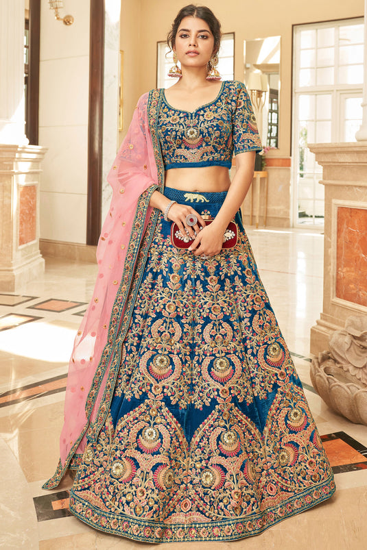 Phenomenal Embroidered Blue Color Velvet Fabric Wedding Wear Lehenga