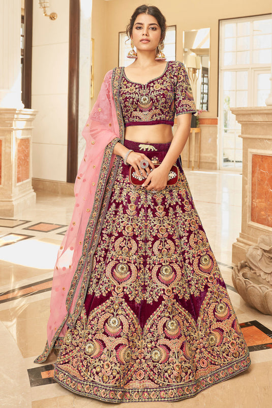 Fashionable Maroon Color Embroidered Velvet Fabric Wedding Wear Lehenga