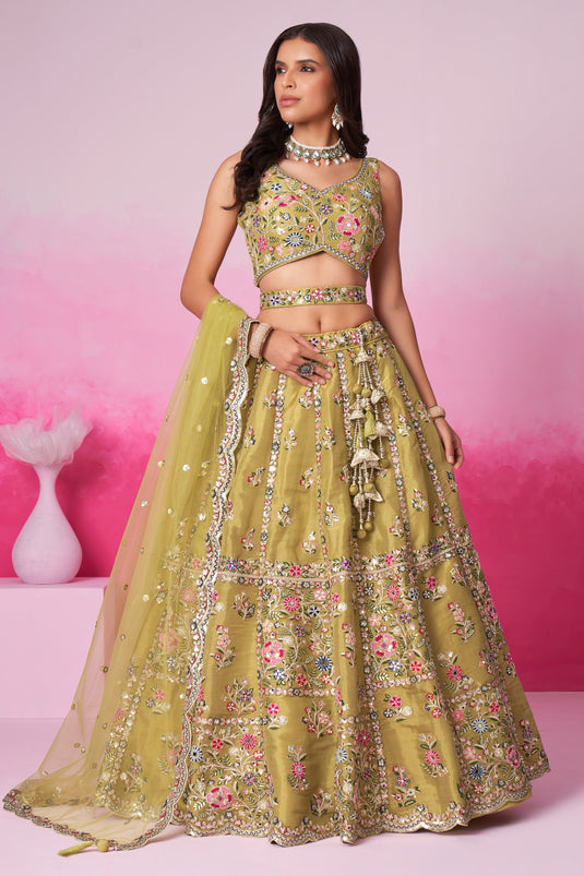 Sequins Work Mustard Net Fabric Sangeet Wear Lehenga Choli