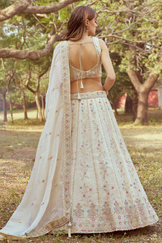 Ornate Heavy Embroidered Bridal Lehenga Choli In Cream Color