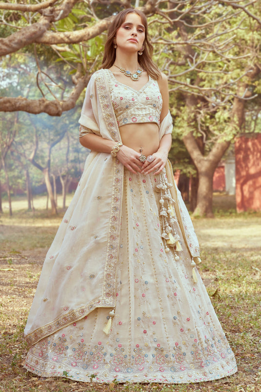 Ornate Heavy Embroidered Bridal Lehenga Choli In Cream Color