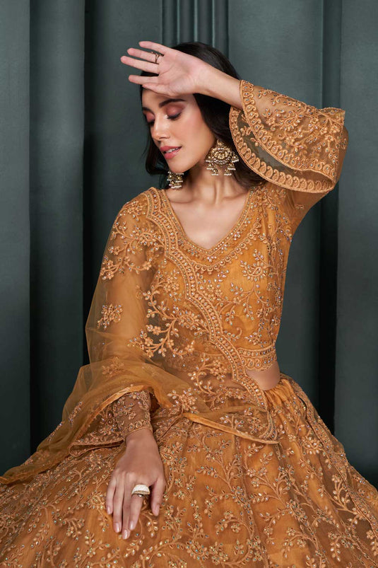 Attractive Wedding Wear Orange Color Net Fabric Lehenga