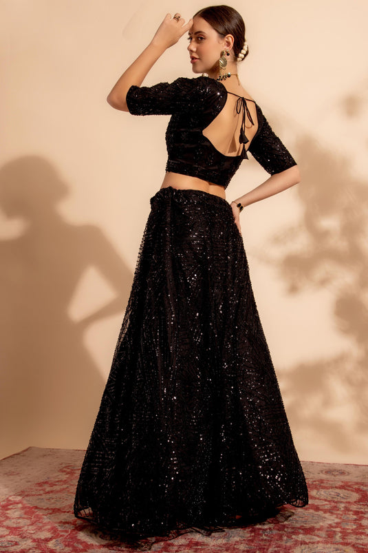 Tempting Net Fabric Black Color Lehenga With Sequins Work