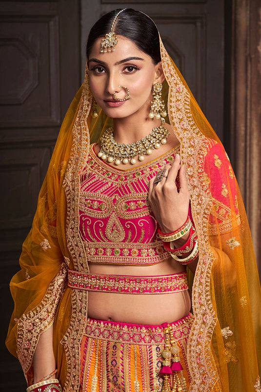 Entrancing Silk Fabric Bridal Lehenga In Mustard Color With Embroidered Work