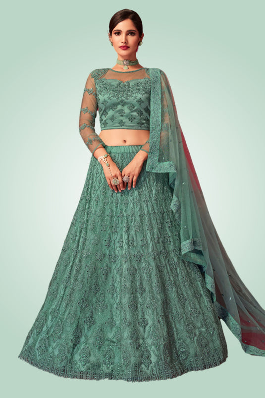 Cyan Color Net Fabric Lehenga Choli With Embroidery Work