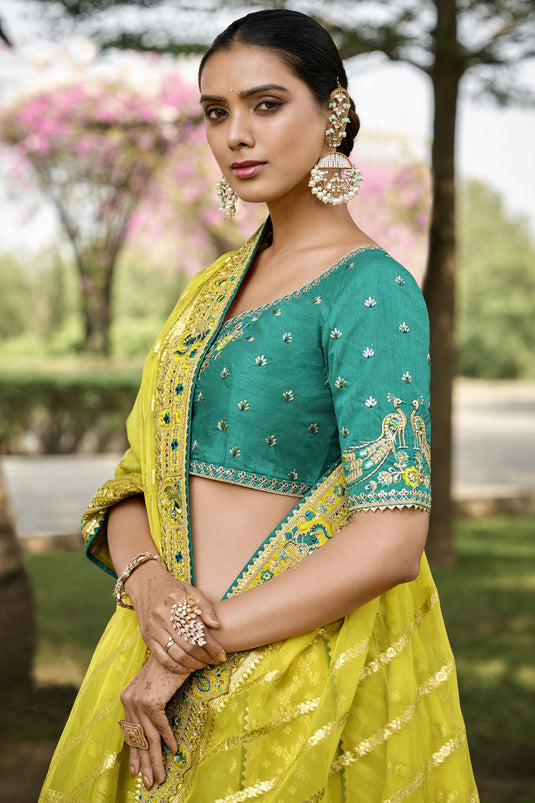 Banarasi Silk Fabric Yellow Color Patterned Lehenga With Jacquard Work