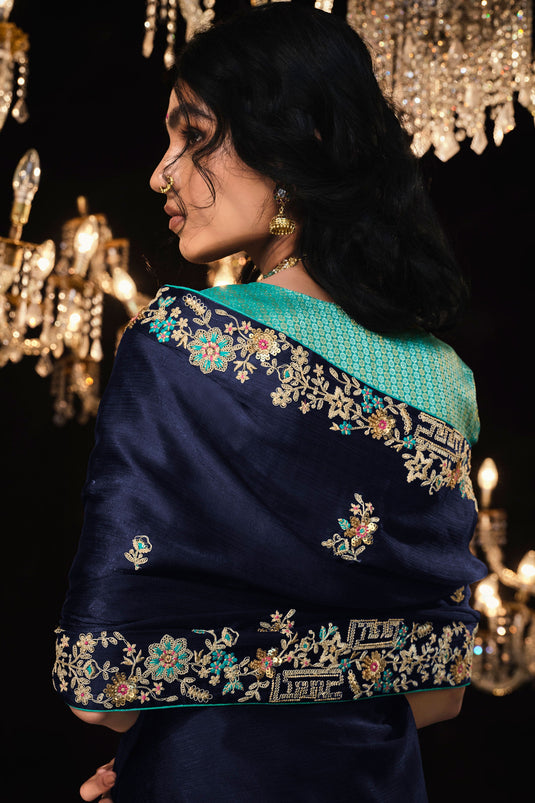 Beguiling Embroidered Work On Blue Color Tissue Fabric Saree