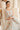 Off White Color Net Fabric Sequins Work Embellished Lehenga
