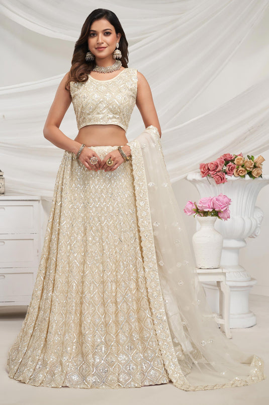 Ingenious Embroidered Cream Color Net Fabric Lehenga