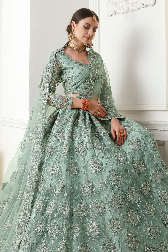 Excellent Sea Green Color Net Fabric Lehenga With Embroidery Work