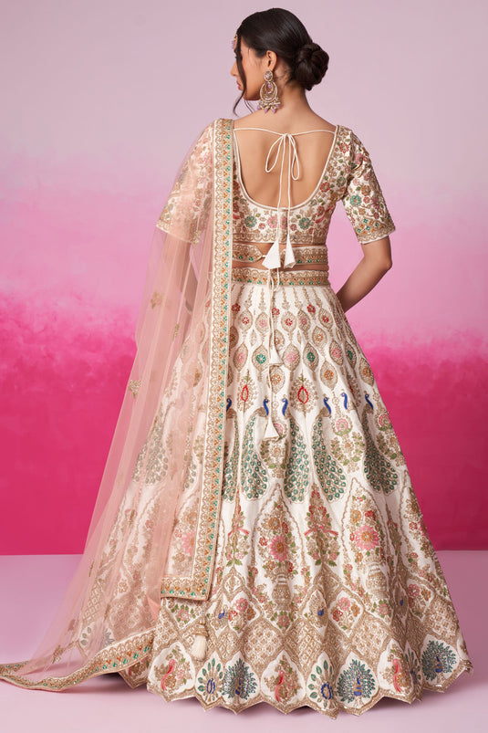 Radiant Sequins Embroidered Cream Color Silk Fabric Bridal Lehenga