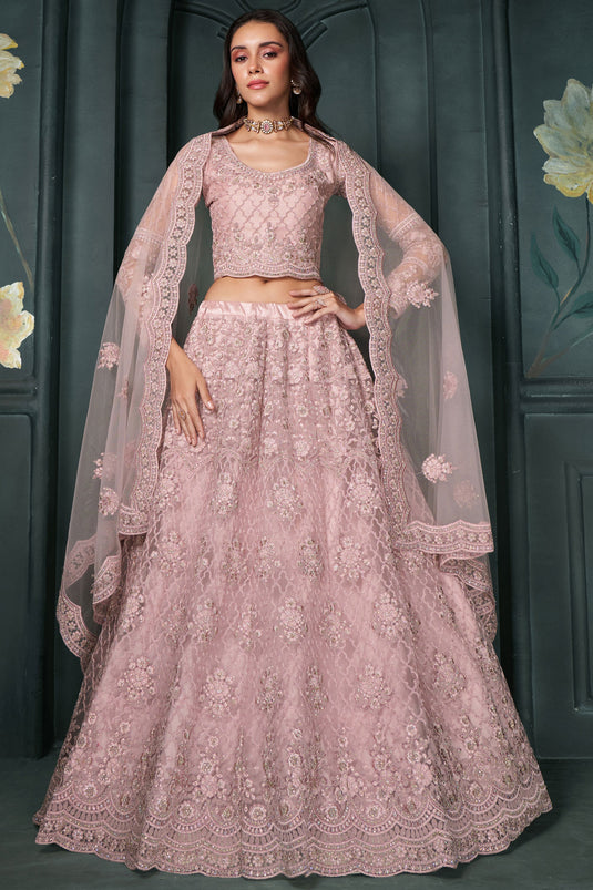 Amazing Embroidered Work On Pink Color Net Fabric Lehenga