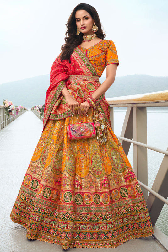 Trendy Silk Fabric Orange Color Wedding Wear Bridal Lehenga