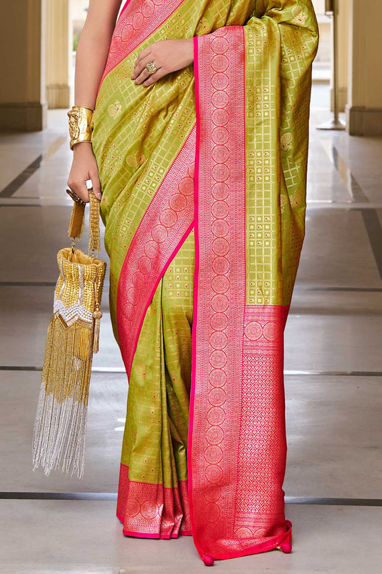 Creative Weaving Work On Banarasi Silk Saree In Olive Color