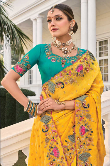 Alluring Yellow Color Stone and Thread Work Crepe Saree