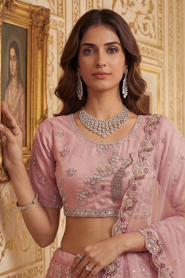 Peach Wedding Wear Net Fabric Embroidered Lehenga Choli