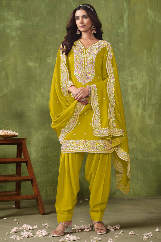 Tempting Art Silk Fabric Yellow Color Festive Wear Salwar Suit