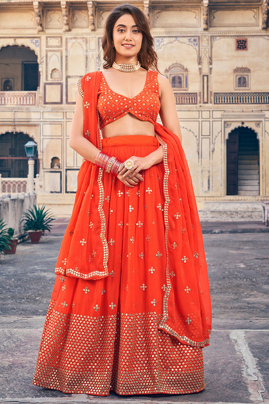Awesome Embroidered Work On Georgette Fabric Orange Color Lehenga