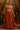 Vibrant Rust Mul Cotton Hand Work Designer Gown For Women