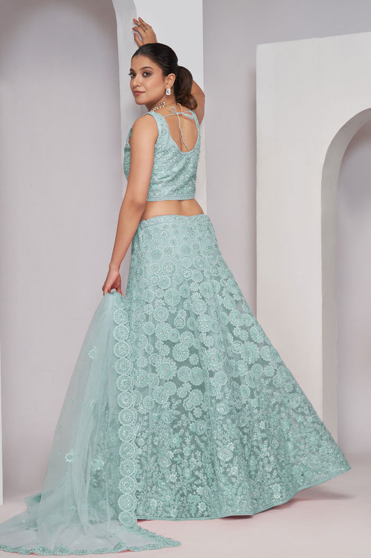 Net Fabric Light Cyan Color Pleasance Lehenga With Sequins Work