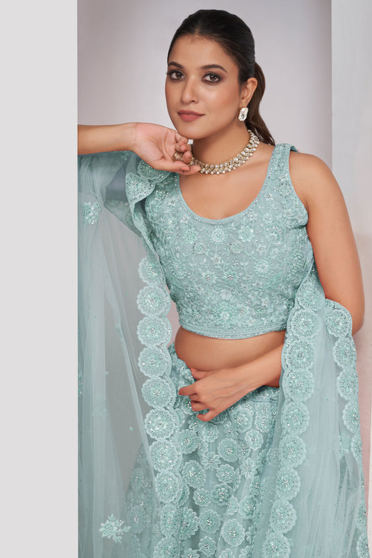 Net Fabric Light Cyan Color Pleasance Lehenga With Sequins Work