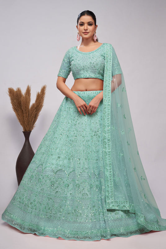 Net Fabric Sea Green Color Excellent Lehenga With Sequins Work