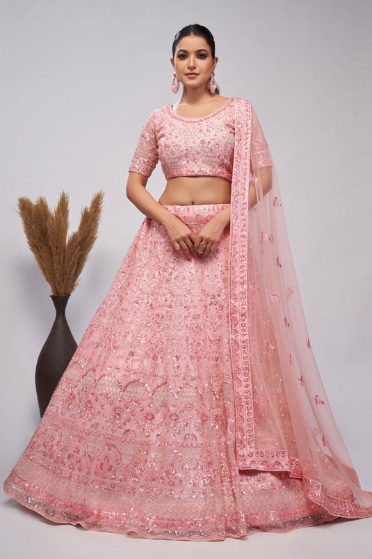 Trendy Net Fabric Pink Color Lehenga With Sequins Work