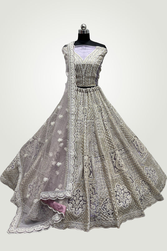 Embroidery Work Grey Color Bridal Wear Lehenga In Net Fabric With Designer Unstitched Blouse