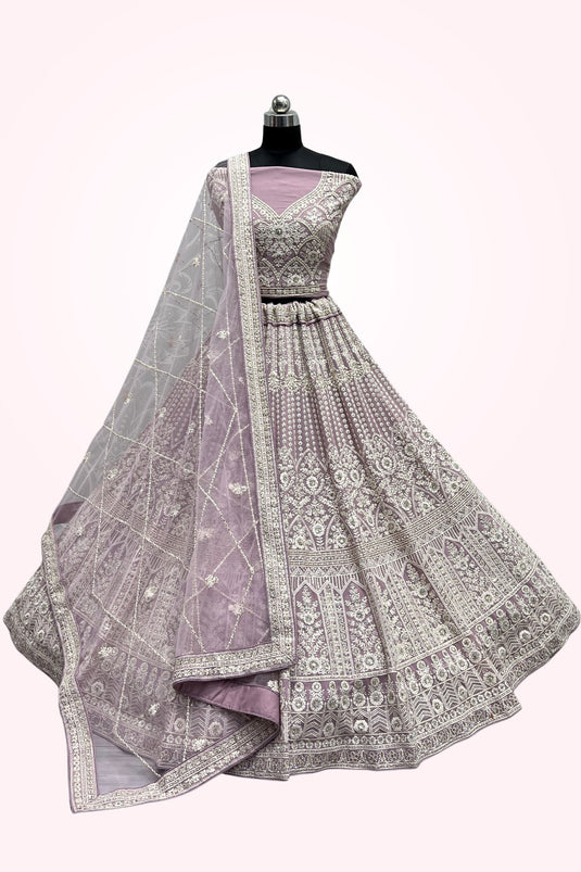 Embroidery Work Bridal Lehenga In Lavender Color Net Fabric With Blouse