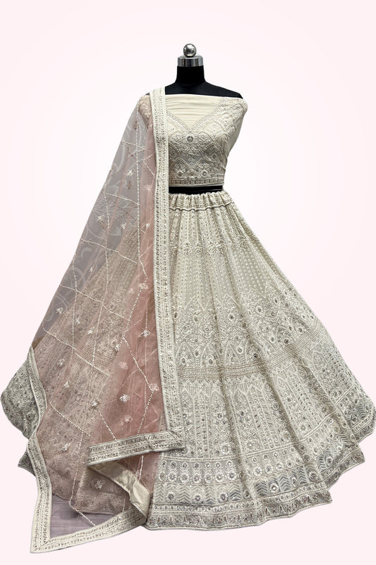 Embroidered Wedding Wear Lehenga Choli In Beige Color Net Fabric